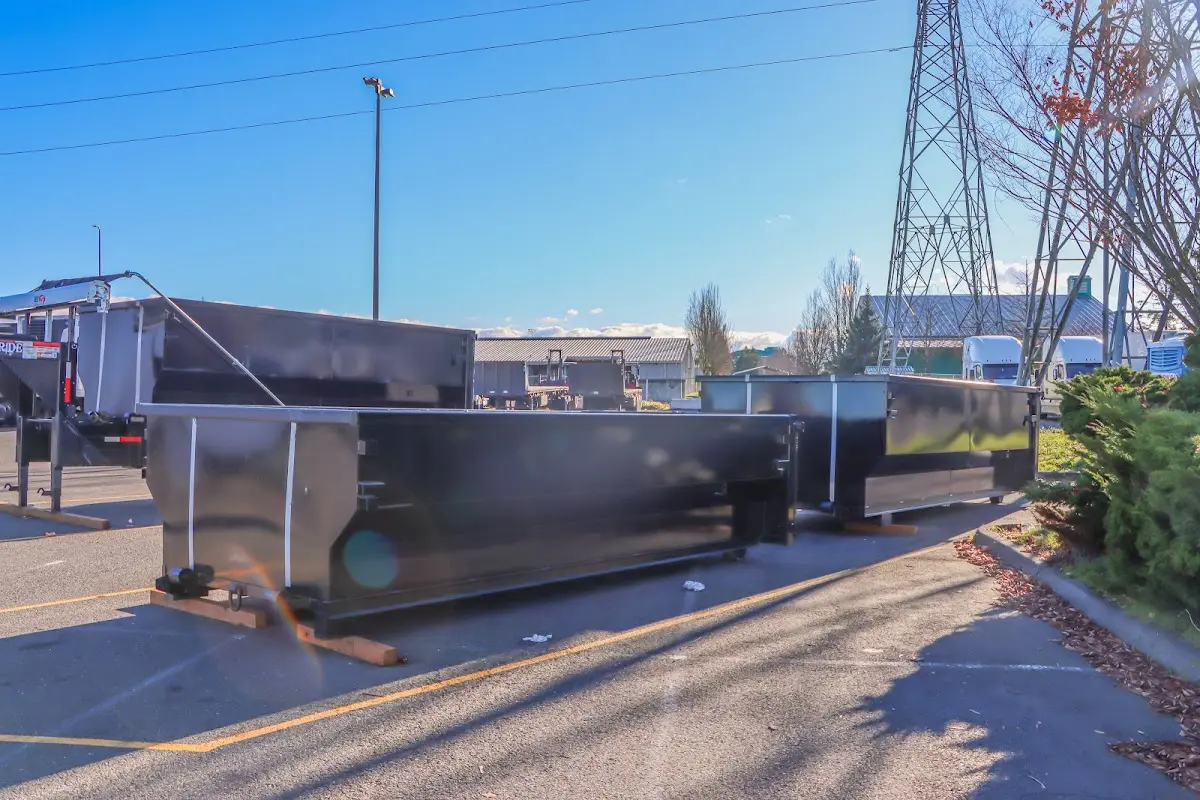 Roll-off dumpster ready for waste disposal at job site for Yard Waste Dumpster Rental in Madisonville